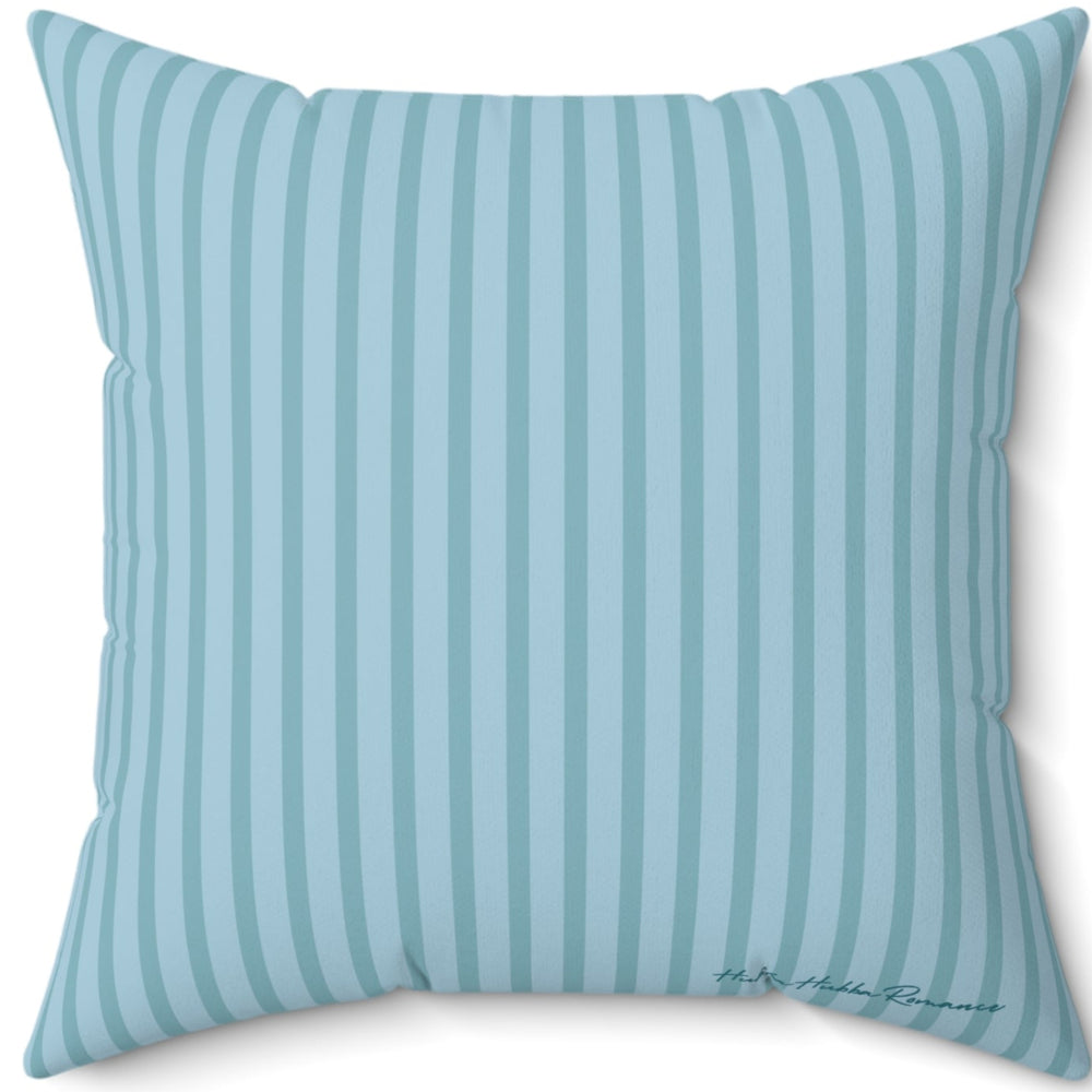 The back side of the pillow is a teal and light blue pin stripe.

