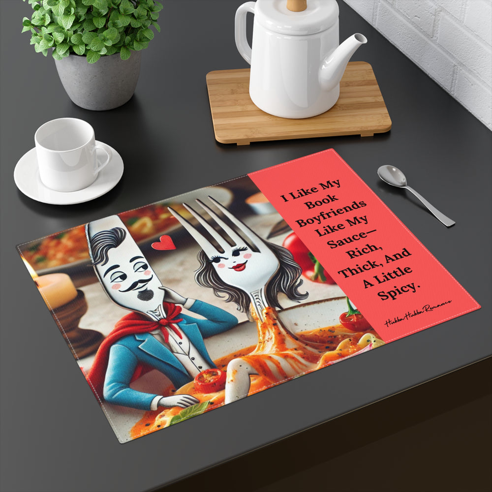 The placemat is displayed on a table with a cup and saucer, a teapot, a plant, and a spoon for context.



