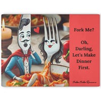 Glass cutting board featuring a playful cartoon illustration of a flirty fork and suave knife, personified with expressive faces. The fork is styled as a woman with long eyelashes and red lips, sitting in pasta with sauce. The knife, styled as a man with a mustache and cape, gazes at her with a heart floating between them. On a coral background, the text reads: “Fork Me? Oh, Darling, Let’s Make Dinner First.” Textured tempered glass with non-slip rubber feet. This is the larger version.