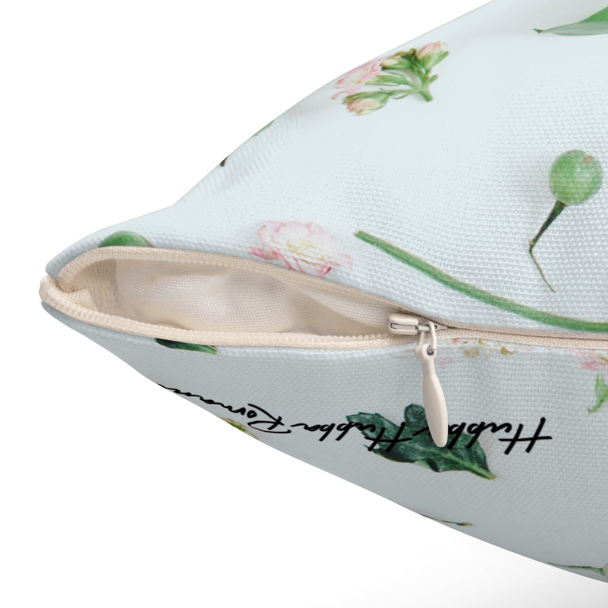 This image shows the pillow's hidden zipper. It also shows how the front and back patterns complement each other.