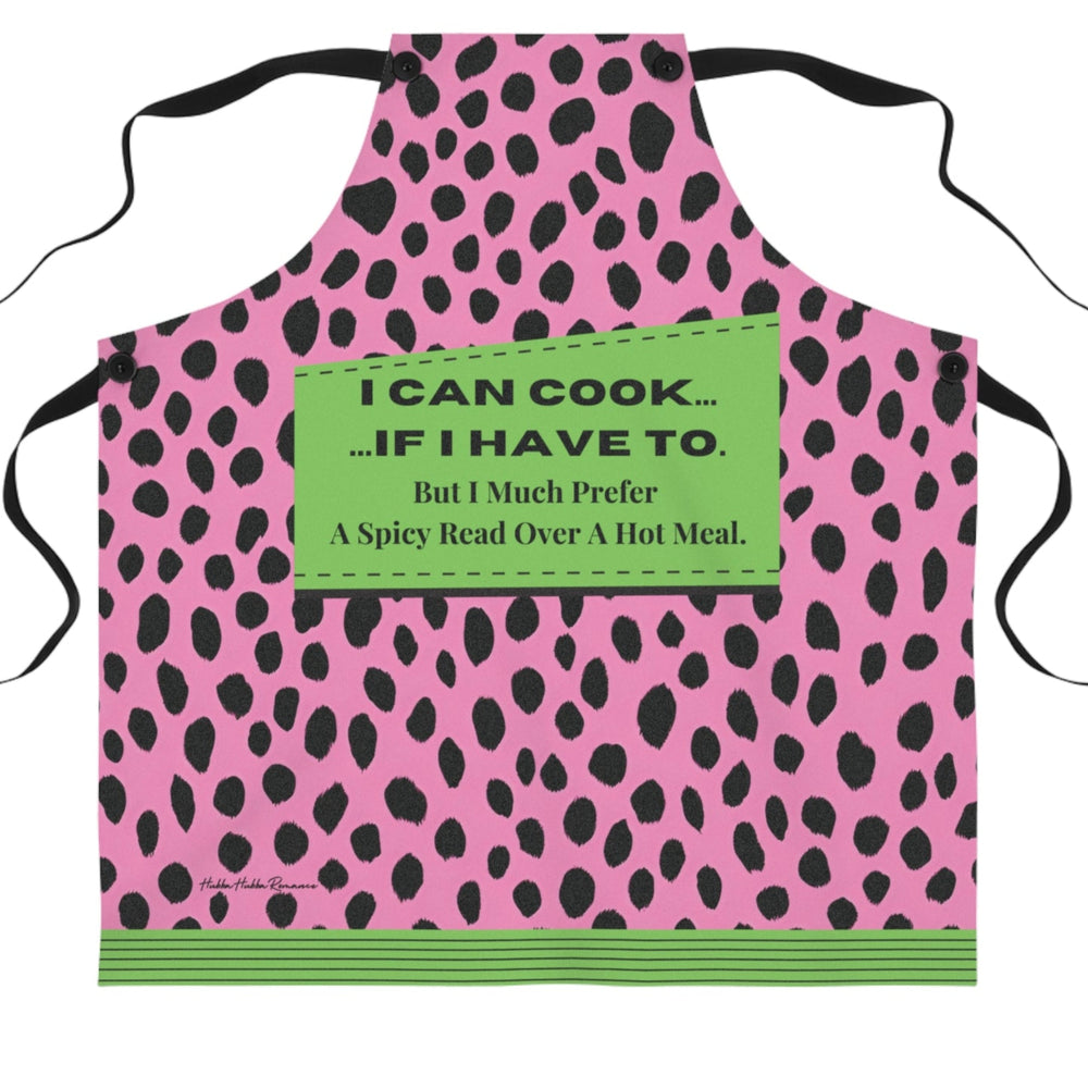 A bold pink and black leopard-print apron with black straps that features a lime green patch with the text: "I CAN COOK... ...IF I HAVE TO. But I Much Prefer A Spicy Read Over A Hot Meal." The bottom of the apron has a coordinating green and black striped trim.

