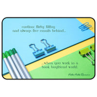 A colorful flat-lay image of bright blue, green, and yellow office supplies—binder clips, pens, and folders. The top text reads, “Caution: flirty, filthy, and always five emails behind.” Bottom text says, “working girl life in a book boyfriend world.” This is the small version.