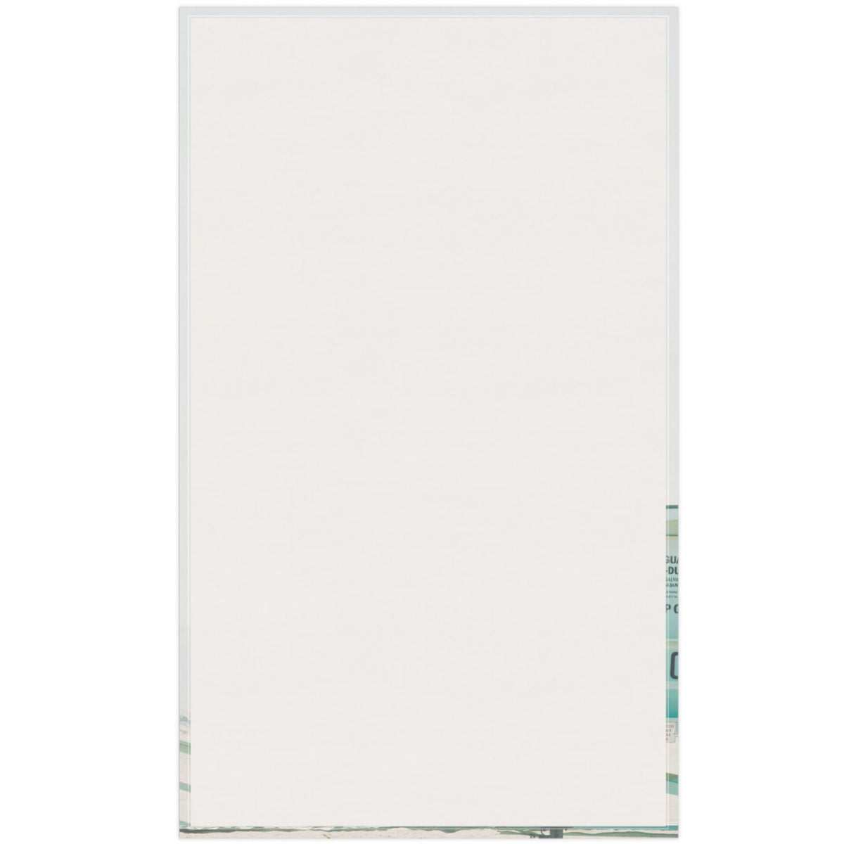 This is the plain cotton back of the kitchen towel being displayed.
