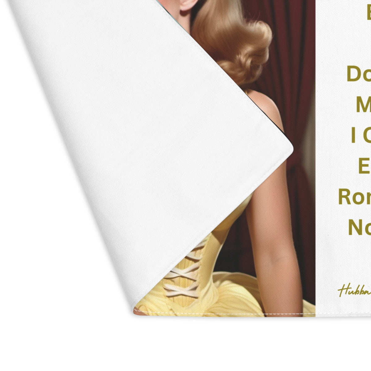 The placemat is folded over at the left corner to show the white cotton backing.
