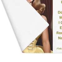 The placemat is folded over at the left corner to show the white cotton backing.
