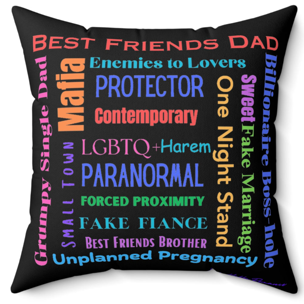 Square pillow with black background, colorful word cloud of romance tropes, including “Best Friend’s Dad,” “Enemies to Lovers,” “Grumpy Single Dad,” “Paranormal,” and “Billionaire Boss-hole.”