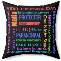 Square pillow with black background, colorful word cloud of romance tropes, including “Best Friend’s Dad,” “Enemies to Lovers,” “Grumpy Single Dad,” “Paranormal,” and “Billionaire Boss-hole.”