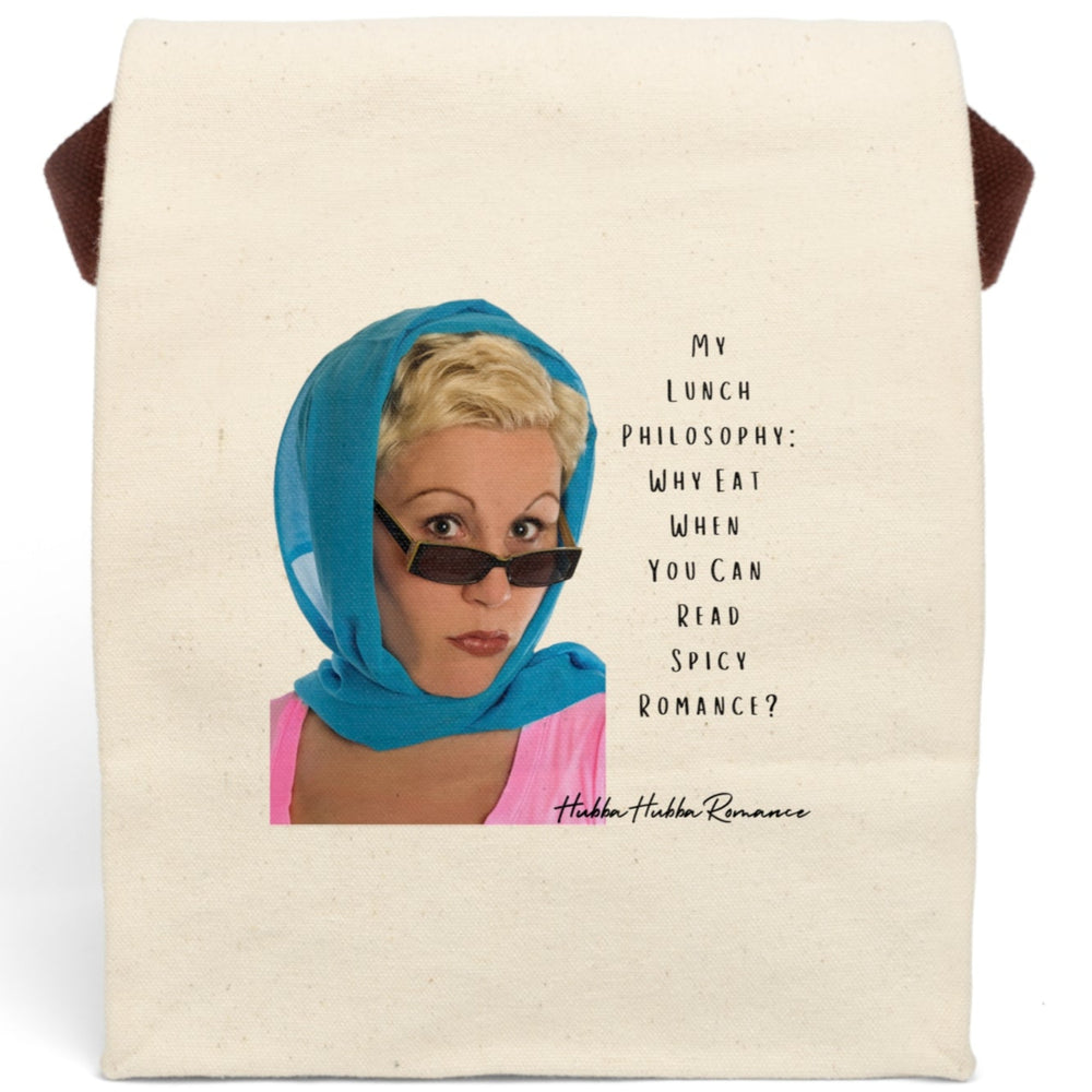 This canvas lunch bag features a retro-inspired image of a blonde woman wearing a bright blue headscarf and sunglasses. She has a bold, confident expression. To the right of her, in a casual black font, the text reads: “My Lunch Philosophy: Why Eat When You Can Read Spicy Romance?” The background is white, and the design channels vintage glamour with a sassy, modern bookish twist. The bag includes a roll-top closure, canvas strap, and durable material for everyday use.