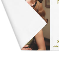 The placemat is folded over at the left corner to show the white cotton backing.

