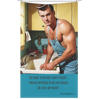 The image features a kitchen towel with a playful romance-themed design hanging on a clothesline secured by clothespins. The towel features a light background with a vintage-style illustration of a rugged, handsome plumber in a tool belt, smirking as if he knows exactly what he's doing. Across the jar, the text reads "The Plumber Stole My Heart" in bold, cheeky lettering. The design incorporates warm, earthy tones, adding a retro feel. The towel blends humor, sass, and romance, perfect for book lovers with 