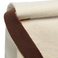 Close-up of the bag closure involving a rollover of the top edge secured by Velcro.