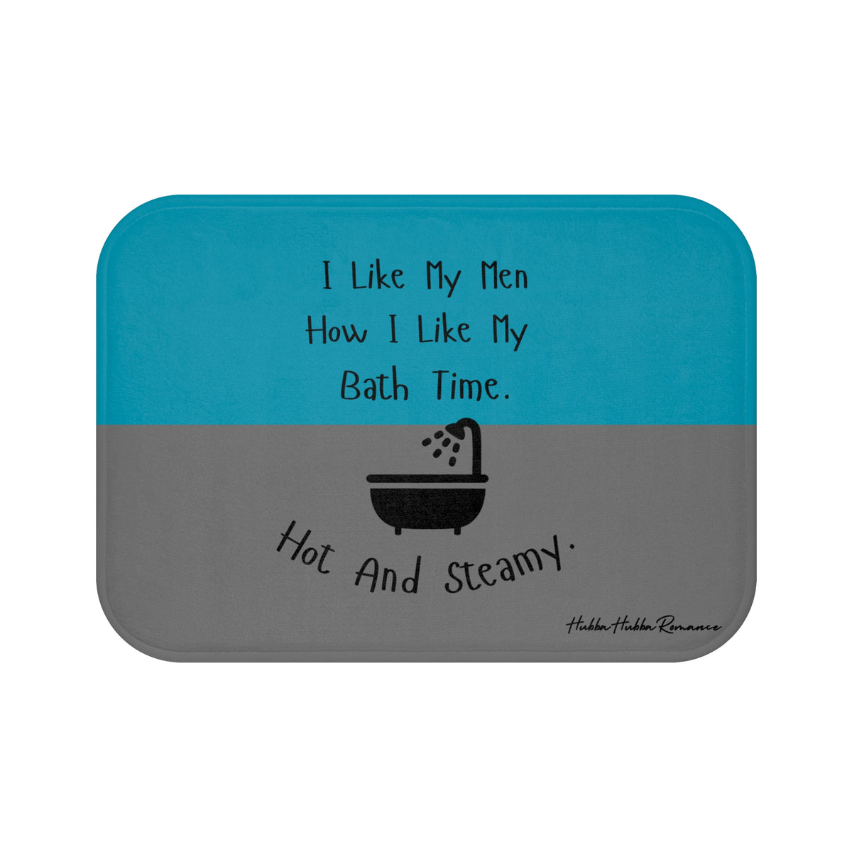 This bath mat features two background colors: teal on the top half and gray on the bottom half. The top half includes playful black text that reads: “I Like My Men How I Like My Bath Time.” Centered in the lower half is a black graphic of a vintage-style bathtub with a shower head spraying water. Below the tub, curved black text reads: “Hot And Steamy.” The mat is soft, absorbent, and designed for romance readers with a cheeky sense of humor.
This is the smaller sized mat.