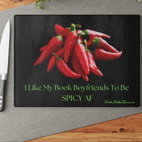 This image shows the cutting board displayed on the table with a knife placed beside it in anticipation of using the board to cut something.

