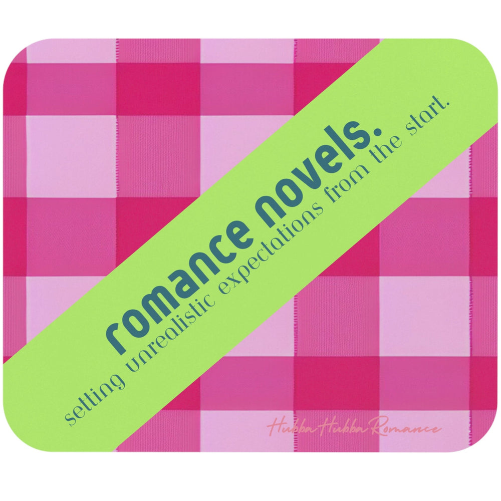 This is a mouse pad with a pink and white plaid background. A lime banner runs from one corner to the opposite corner. The aqua blue text on the banner reads, “Romance novels. Setting unrealistic expectations from your first read."