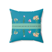 An 18-inch pillow that features an arrangement of delicate wildflowers, some upright and others hanging upside down, against a vibrant teal background. A horizontal light green banner stretches across the center, displaying the phrase "I'm just a wildflower waiting for the right bee to notice." in black text. The design is whimsical and romantic, symbolizing patience, individuality, and the hope of finding the perfect match.