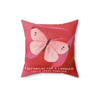 A16-inch pillow featuring a soft pink butterfly with delicate brown markings on its wings, set against a blurred close-up of a pink flower petal. The butterfly has a watercolor-like texture and a graceful appearance. Below the butterfly, pale pink uppercase text reads: "If butterflies had a language, they’d speak romance." The background is a warm, romantic shade of pink, creating a dreamy and whimsical aesthetic.