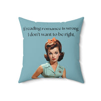 A 18-inch pillow featuring a vintage-inspired illustration of a glamorous 1950s woman with red hair styled in curls, wearing a mint green blouse with orange buttons, an orange skirt, a black belt, and a matching orange bow in her hair. She has bold red lipstick and a skeptical expression. The background is a solid teal color. Above her, black text reads: "If reading romance is wrong, I don’t want to be right."