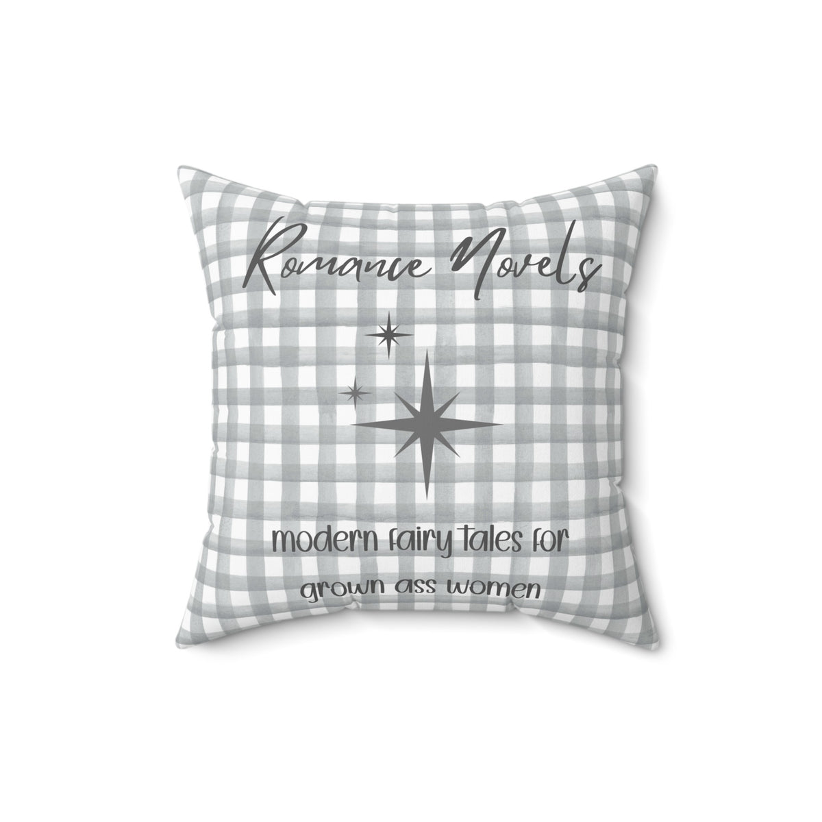 A 16-inch pillow featuring a gray and white gingham background with elegant script text that reads: "Romance Novels." Below, in a playful handwritten-style font, the phrase "modern fairy tales for grown ass women" is written. To the left of the text, there are three gray starbursts, adding a touch of vintage charm. The overall design is minimalist yet bold, appealing to romance readers who embrace their love for modern-day fairy tales.