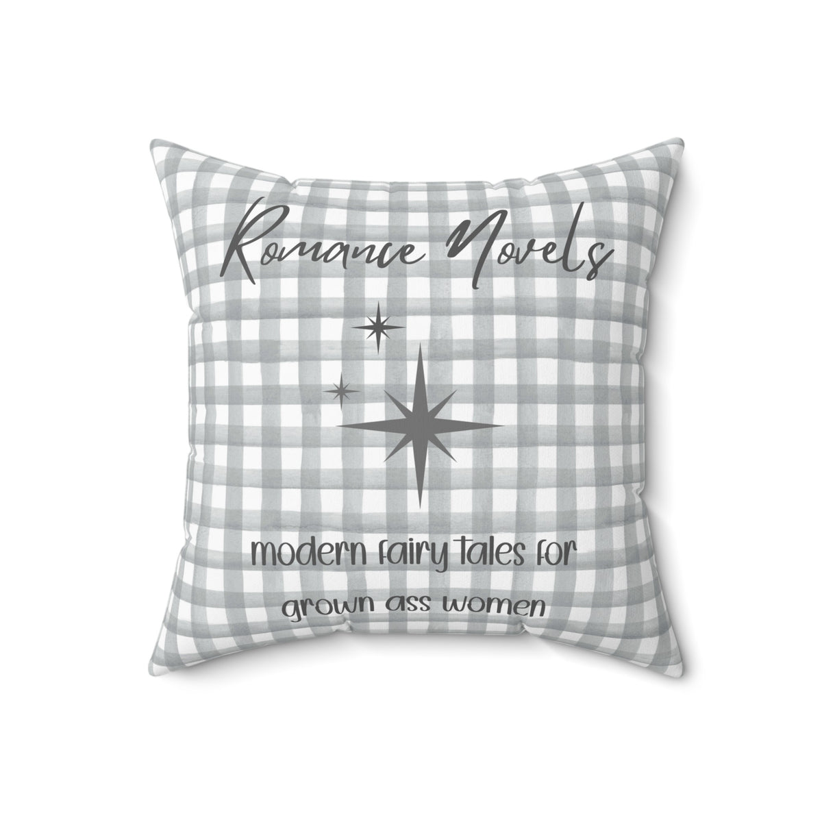 An 18-inch pillow featuring a gray and white gingham background with elegant script text that reads: "Romance Novels." Below, in a playful handwritten-style font, the phrase "modern fairy tales for grown ass women" is written. To the left of the text, there are three gray starbursts, adding a touch of vintage charm. The overall design is minimalist yet bold, appealing to romance readers who embrace their love for modern-day fairy tales.