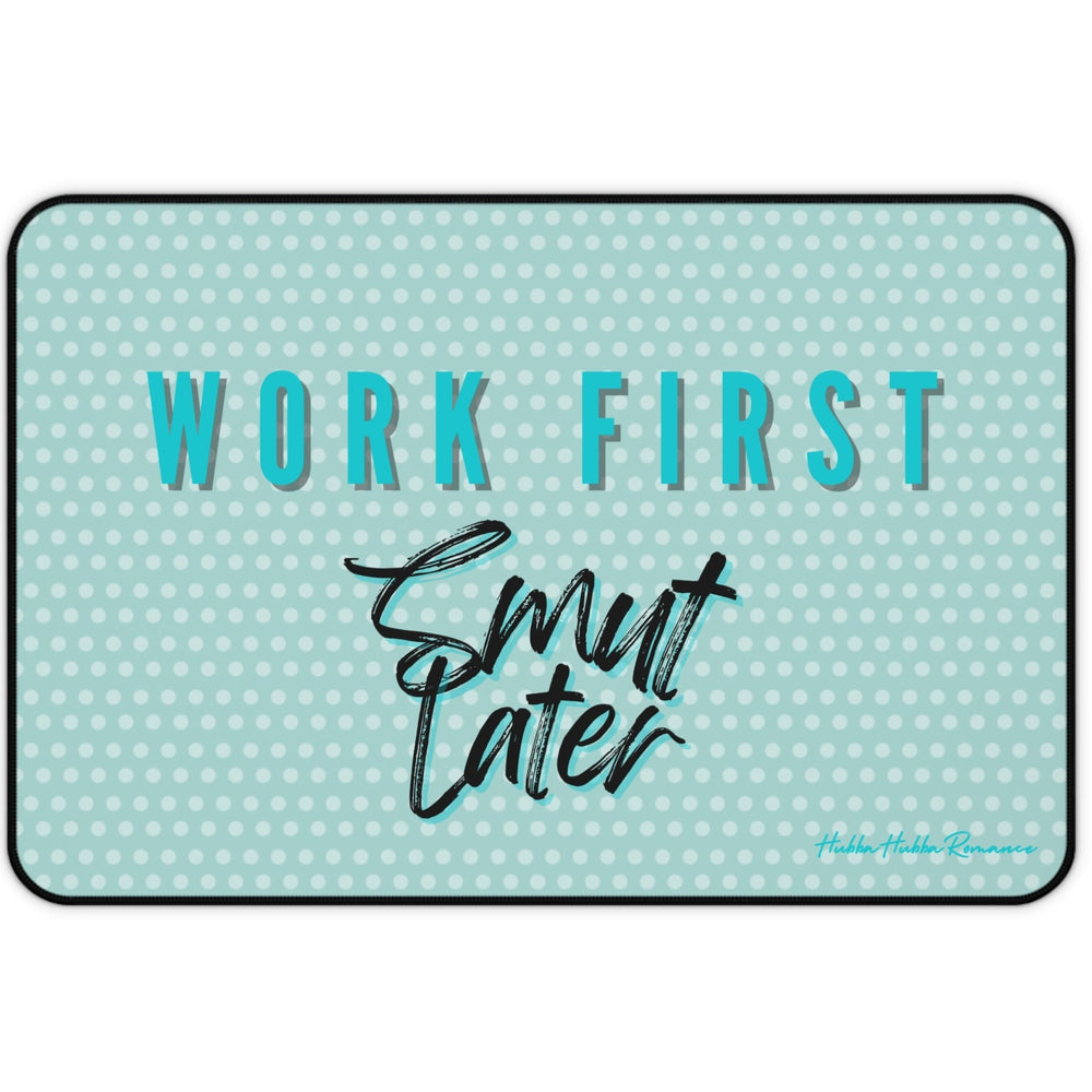 Teal doormat with text 'Work First, Smut Later' on a light blue polka dot background