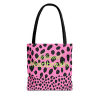 Image shows a pink background with bold, irregular black leopard spots. On one half of the image, the words “fictional heartbreaks” are written in light green cursive and block letters. Flipped upside down on the other half is the word “HEA” in matching green, also in mirrored script and block lettering. The design is playful and reversible, representing the highs and lows of romance reading. This double-sided tote is perfect for book lovers navigating love, loss, and happy endings.