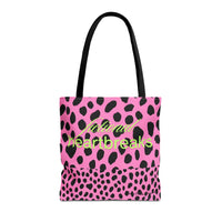 Image shows a pink background with bold, irregular black leopard spots. On one half of the image, the words “fictional heartbreaks” are written in light green cursive and block letters. Flipped upside down on the other half is the word “HEA” in matching green, also in mirrored script and block lettering. The design is playful and reversible, representing the highs and lows of romance reading. This double-sided tote is perfect for book lovers navigating love, loss, and happy endings.