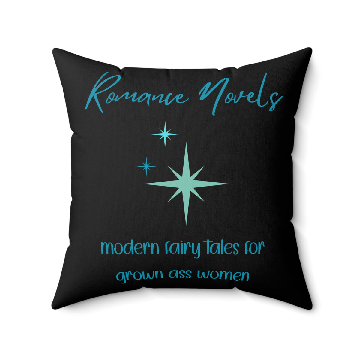 Square pillow with black background, teal starbursts, and text: “Romance Novels. Modern fairy tales for grown ass women.”