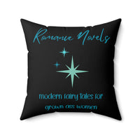 Square pillow with black background, teal starbursts, and text: “Romance Novels. Modern fairy tales for grown ass women.”