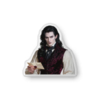 Custom-shaped gothic vampire book boyfriend decorative pillow featuring a pale, dark-haired aristocratic man holding a sealed letter, wearing a burgundy patterned vest and white shirt against a transparent background. Available in three sizes: 10″ × 10″, 16″ × 16″, and 22″ × 22″.