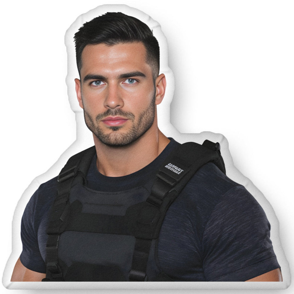 Custom-shaped alpha protector book boyfriend pillow featuring a muscular modern romance hero in tactical gear, designed for romance readers and bold cozy home decor. Available in three sizes: 10″ × 10″, 16″ × 16″, and 22″ × 22″.