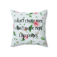 A 18 inch pillow featuring an all-over image featuring a small print composition of pink roses, green leaves, and small green buds scattered on a white background. Overlaid in bold, black handwritten-style text is the phrase: "I don’t chase men. I don’t swipe right. I flip pages." The small print floral background gives the image a soft, romantic feel, while the text adds a sassy and book-lover-friendly attitude.